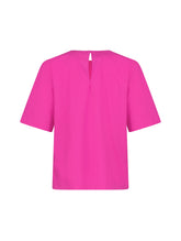 Hochgeschlossene Bluse aus Baumwolle im T-Shirt-Stil mit Knopfverschluss auf der Rückseite. Aus nachhaltiger Baumwolle gefertigt.