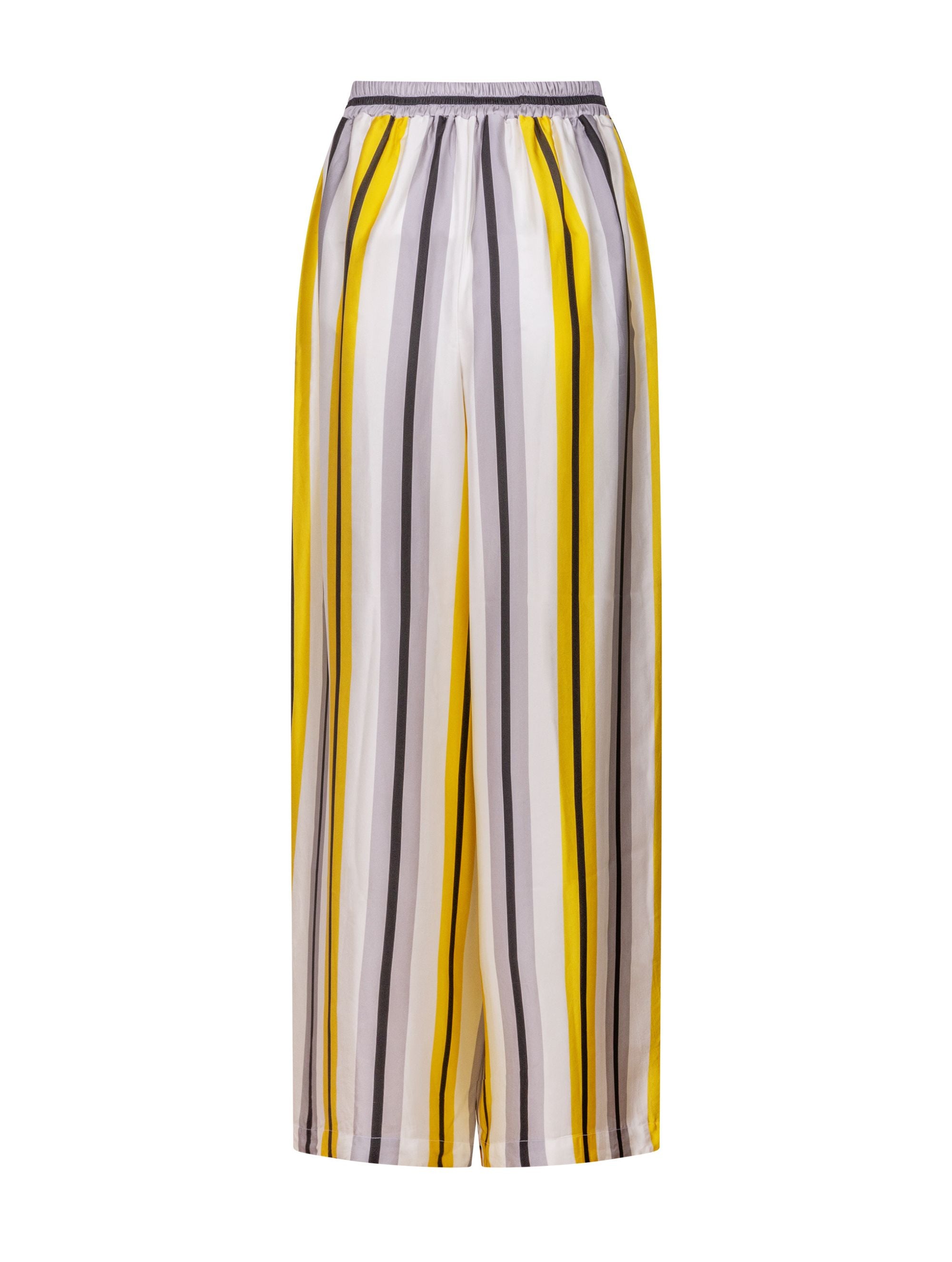 Bedruckte Satin-Seidenhose mit weitem Bein im Pyjama-Stil, elastischem Bund und Seitentaschen. Hergestellt aus Naturfasern.