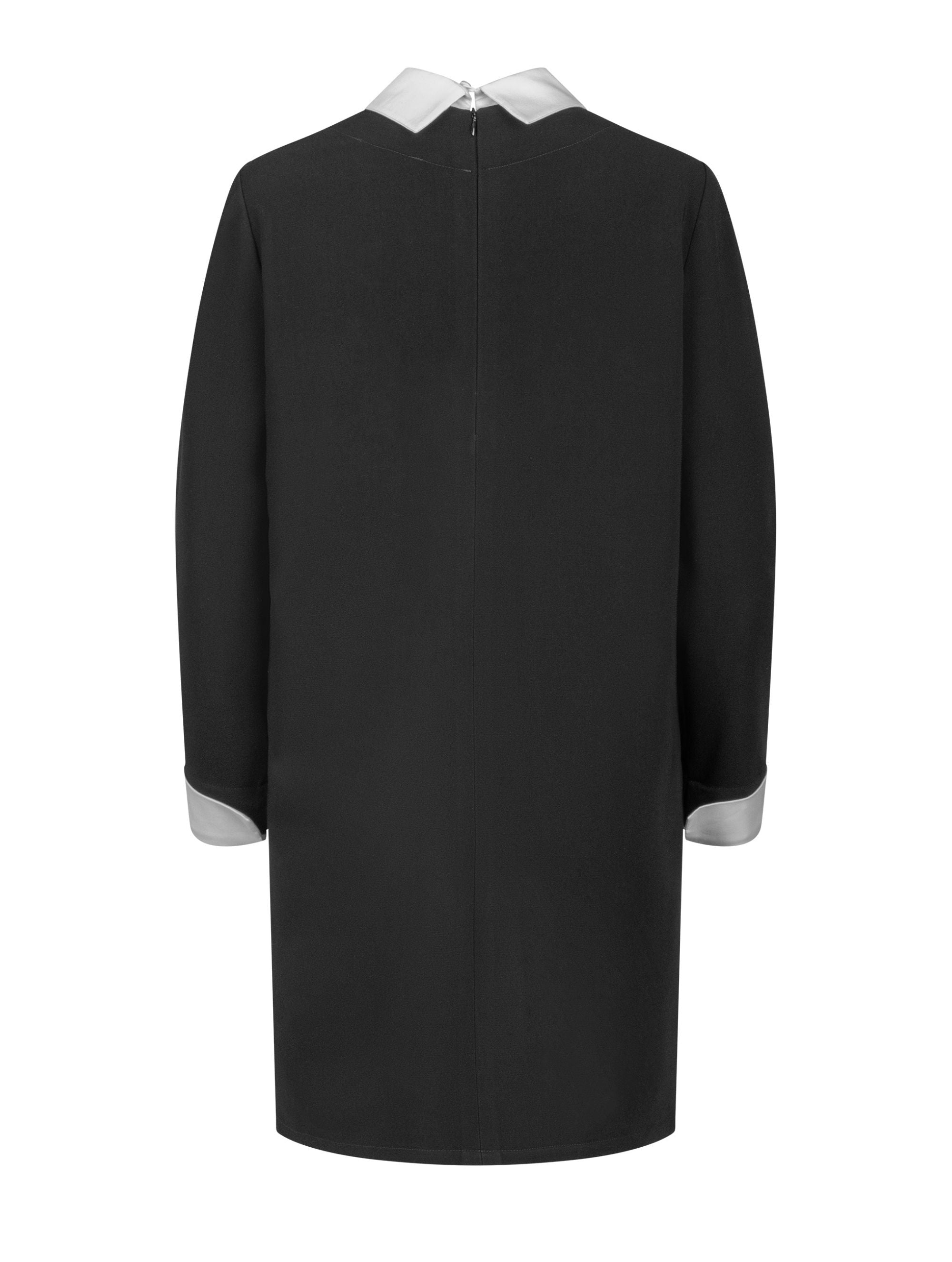 Locker geschnittenes Minikleid mit abnehmbarem Kragen und abnehmbaren Manschetten aus weißer Baumwolle. Reißverschluss auf dem Rücken.