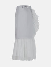 Figurbetonter knielanger Wickelrock mit doppelgelegtem breiten Volant aus Tüll und Bändern zum Binden in der Taille. Dieses Modell ist Teil unserer Reborn Linie, da es aus dem ehemaligen Rock Berta hergestellt worden ist.