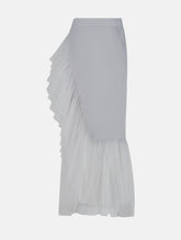 Figurbetonter knielanger Wickelrock mit doppelgelegtem breiten Volant aus Tüll und Bändern zum Binden in der Taille. Dieses Modell ist Teil unserer Reborn Linie, da es aus dem ehemaligen Rock Berta hergestellt worden ist.