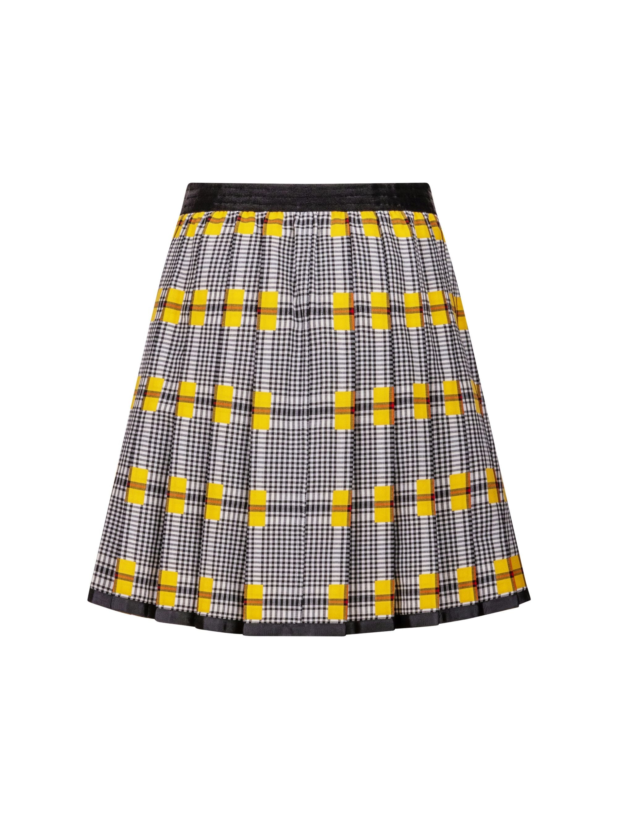 Doppelseitig karierter Faltenminirock mit elastischem Bund und Knopfleiste auf der Vorderseite. Der Rock kann von beiden Seiten getragen werden. Hergestellt aus Naturfasern.