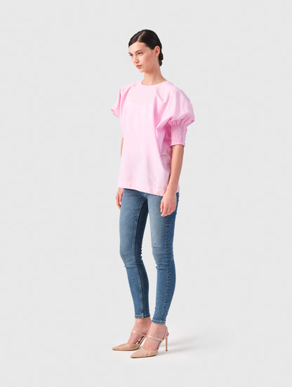 Locker sitzende Bluse mit elastischen Bündchen an den Ärmelenden. 