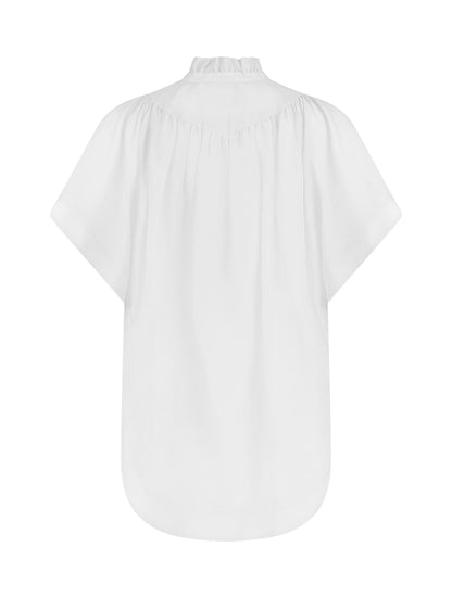 Transparente Bluse mit Stehkragen, auffälligen Ärmeln und durchgehender Knopfleiste auf der Vorderseite. Gefertigt aus einer hochwertigen Baumwoll-Seiden-Mischung.