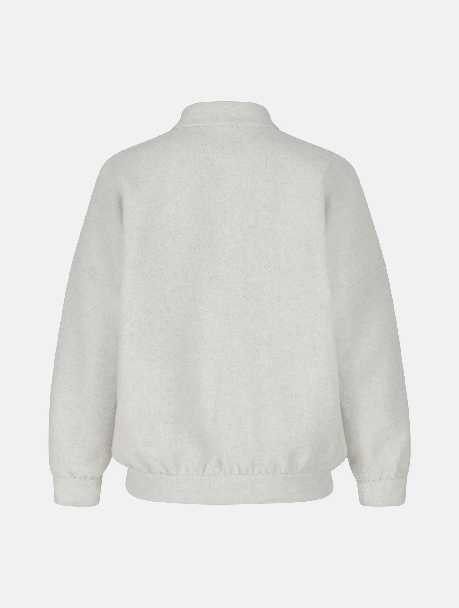 Wendbare Blousonjacke aus hochwertiger Merinowolle mit Stehkragen, Bündchen an den Ärmelenden und am Saumende, sowie seitlichen Leistentaschen auf der helleren Seite und großen aufgesetzten Taschen auf der dunkleren Seite. Dieses Modell ist Teil unserer REBORN-Linie und steht für unsere &quot;Zero-Waste-Politik&quot;, da mit Stoff aus Altbestand gefertigt.