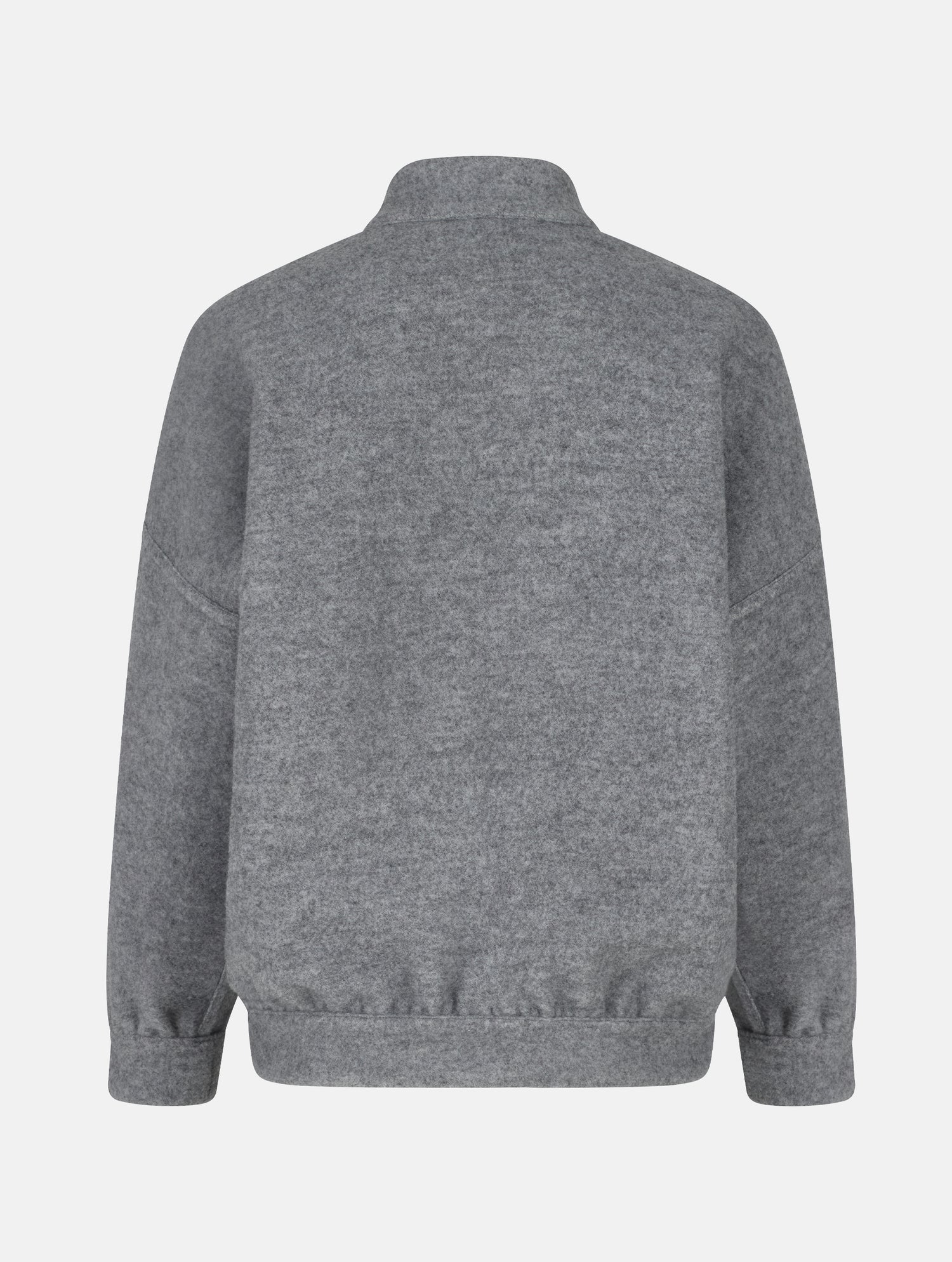 Wendbare Blousonjacke aus hochwertiger Merinowolle mit Stehkragen, Bündchen an den Ärmelenden und am Saumende, sowie seitlichen Leistentaschen auf der helleren Seite und großen aufgesetzten Taschen auf der dunkleren Seite. Dieses Modell ist Teil unserer REBORN-Linie und steht für unsere &quot;Zero-Waste-Politik&quot;, da mit Stoff aus Altbestand gefertigt.