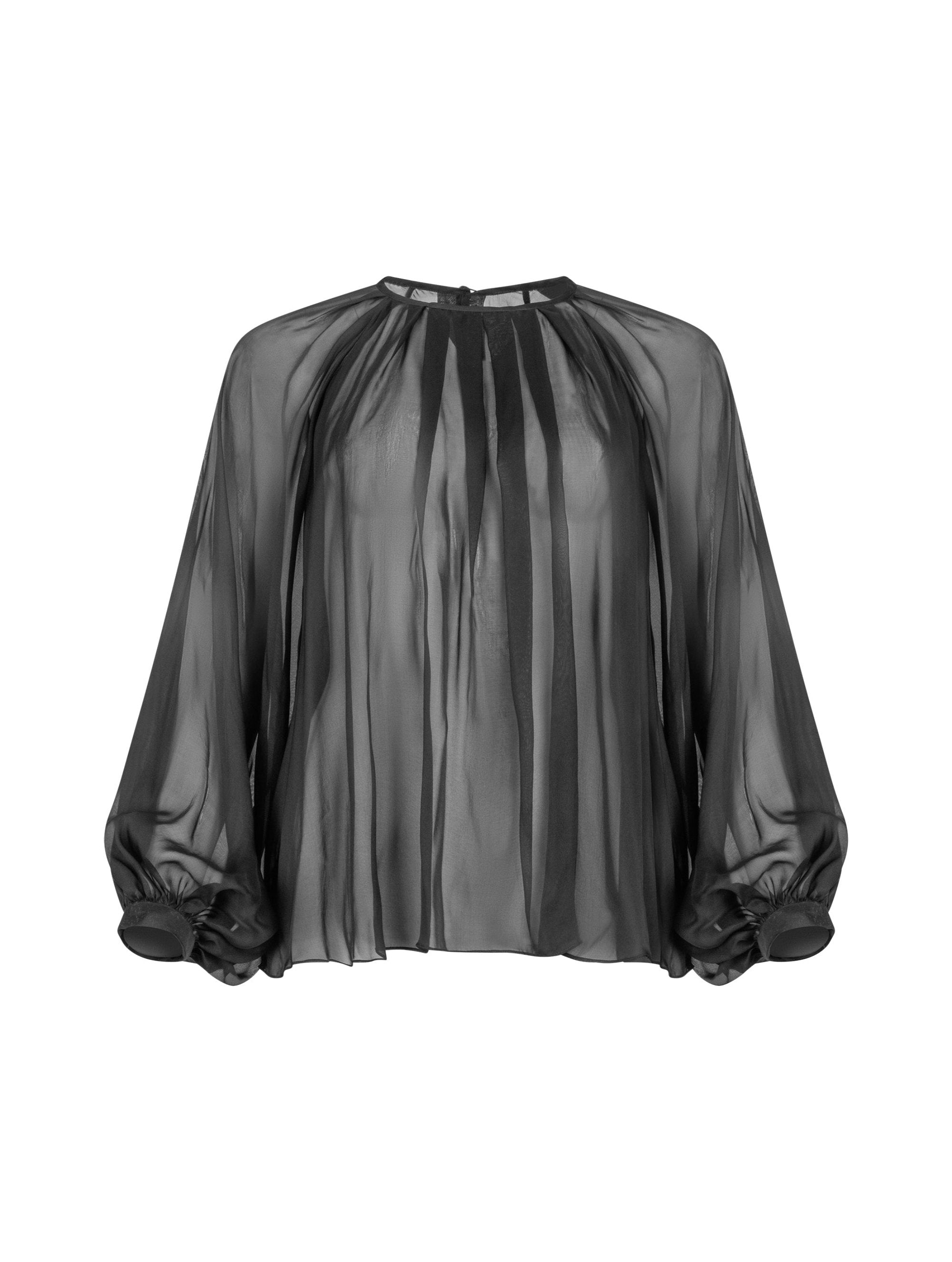 Weite Bluse mit Rundhalsausschnitt, Falten auf der Vorder- und Rückseite und Raglan-Dichterärmeln.    Dieses Modell ist Teil unserer REBORN-Kollektion und steht für unsere "Zero-Waste-Politik".  