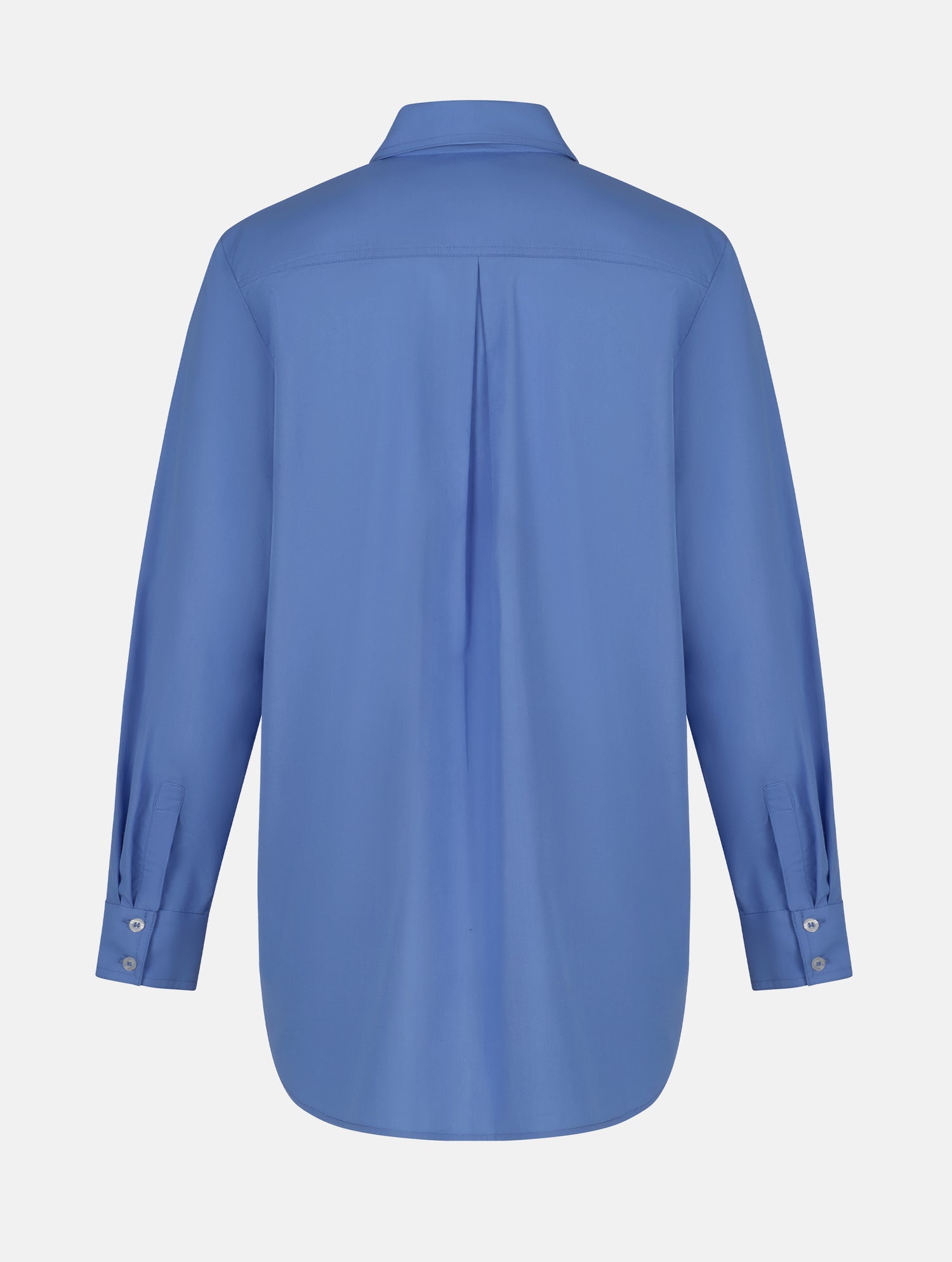 Langes Oversize Blusenhemd mit klassischem Hemdkragen und Manschetten, sowie zwei aufgesetzten Brutstaschen und abgerundeten Saumende im Rückteil.  Dieses Modell ist Teil unserer REBORN-Linie und steht für unsere &quot;Zero-Waste-Politik&quot;, da mit Stoff aus Altbestand gefertigt.