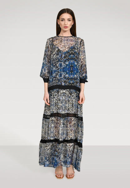 Maxi Kleid aus zarter Chiffonseide mit einen bezaubernden Blütenprint, Schleifen an den Ärmeln und abnehmbaren Volants.