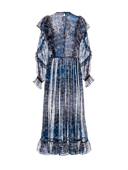 Atemberaubendes Maxikleid aus leicht transparenter Chiffonseide, kunstvollem Blütenprint und feinen Volants.
