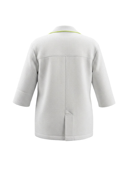 Leichter, figurbetonter Sommerblazer aus weißem Baumwoll-Waffelpiqué mit frischen limefarbenen Details. Ungefüttert, nahezu knitterfrei und Teil unserer Reborn Linie.