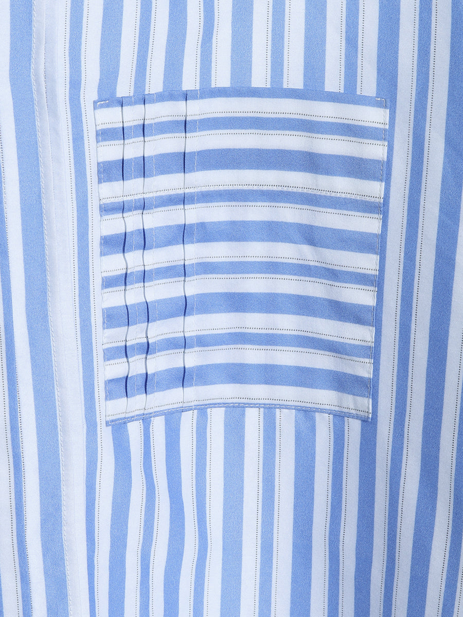 Oversize Bluse aus hochwertige Baumwolle, praktischer Brusttasche und subtilen Biesen-Falten.