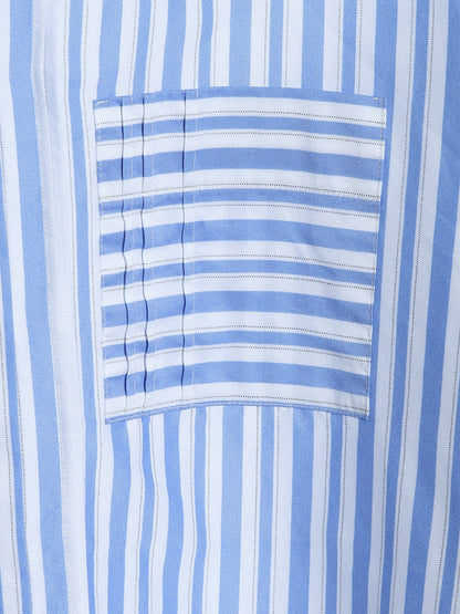 Oversize Bluse aus hochwertige Baumwolle, praktischer Brusttasche und subtilen Biesen-Falten.
