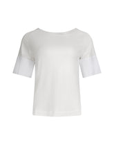 Jersey-T-Shirt mit Bateau-Ausschnitt, Seitenschlitzen und Bündchendetails aus weißer Baumwolle. Dieses Modell ist Teil unserer REBORN-Kollektion und steht für unsere "Zero-Waste-Politik".