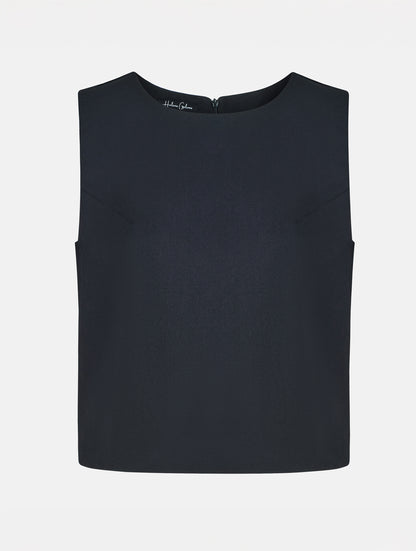 Grade geschnittenes kurzes Top aus Woll-Mix mit abnehmbaren langen Fransen aus Viskose. Dieses Modell ist Teil unserer Reborn Linie, da aus dem ehemaligen Top Alissa hergestellt worden ist.