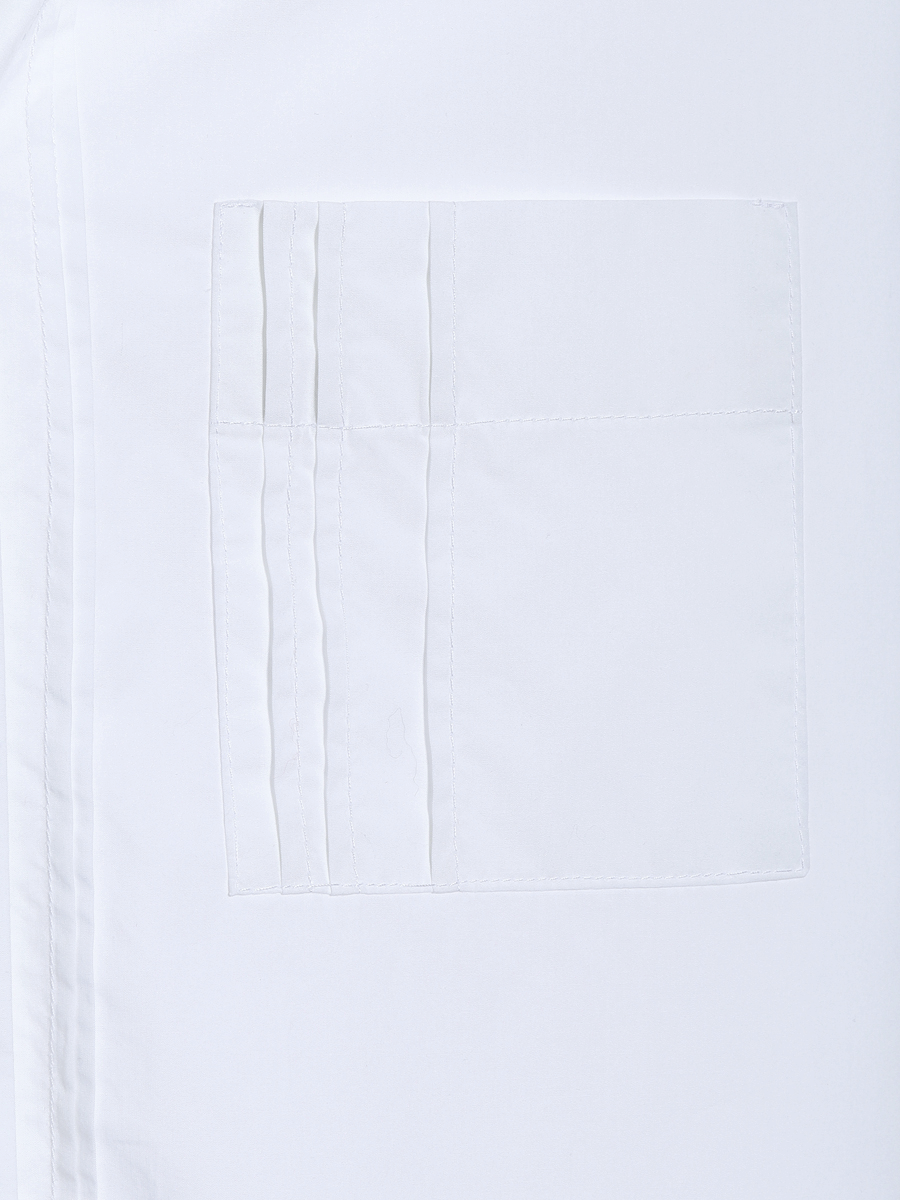 Oversize Bluse aus hochwertige Baumwolle, praktischer Brusttasche und subtilen Biesen-Falten